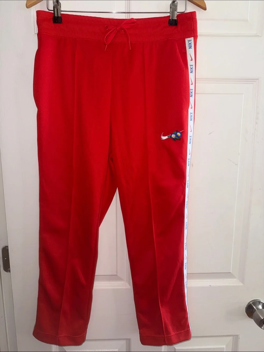 Nike Red Track Pants with White Logo Tape